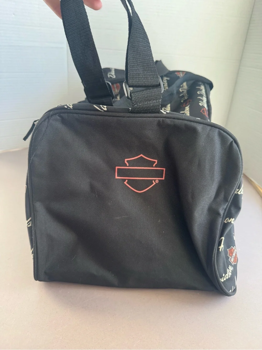 Harley-Davidson Black Duffel with White Script and Orange Accents